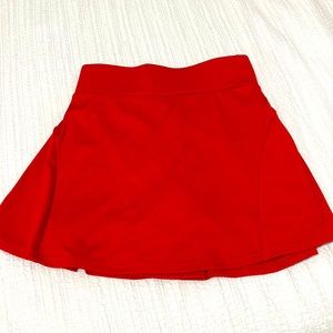 Red Pleaded Skort (size small)